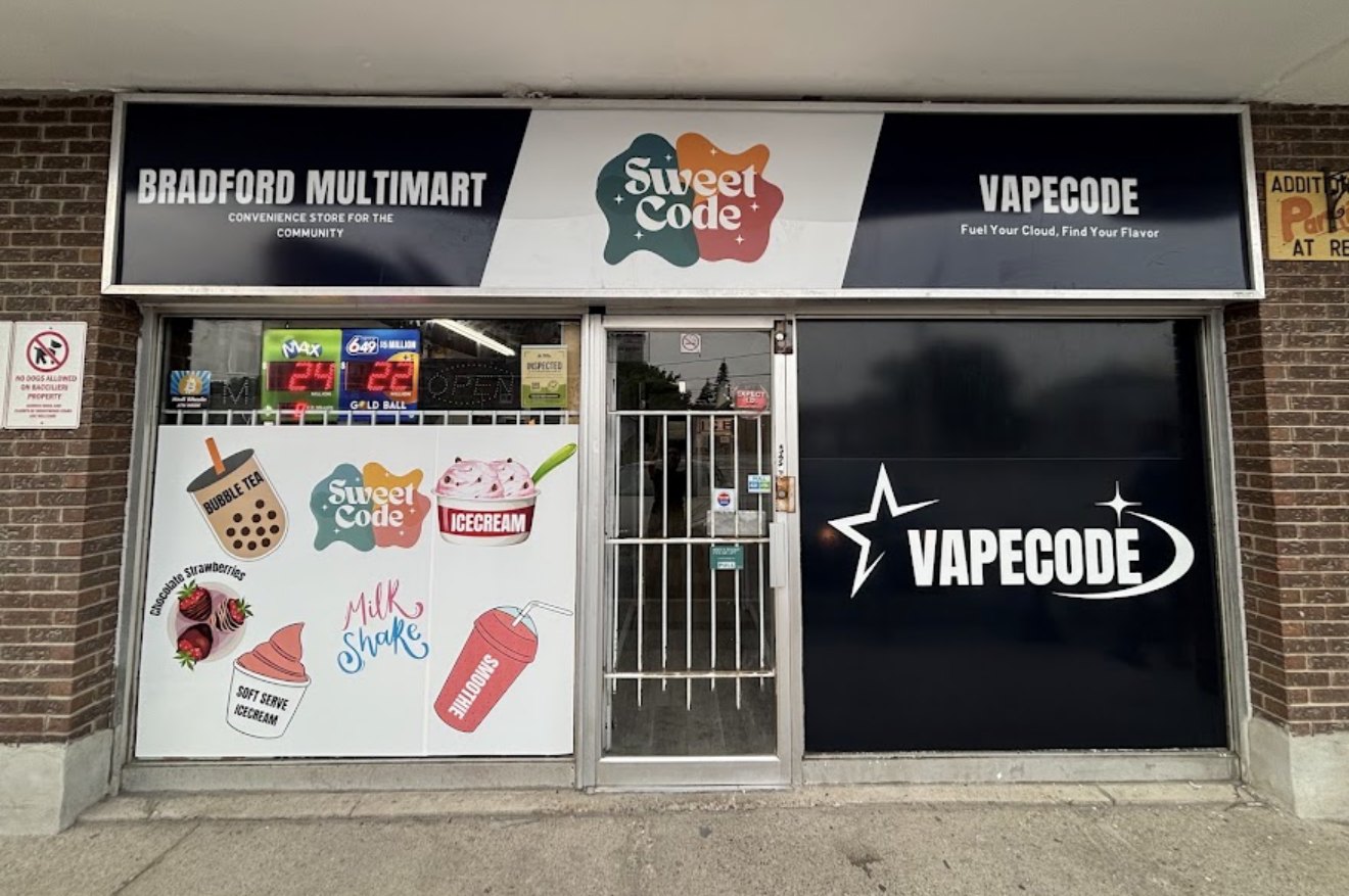 Sweet Code storefront at 105 Holland St W in Bradford, Ontario, beside Bradford Multimart