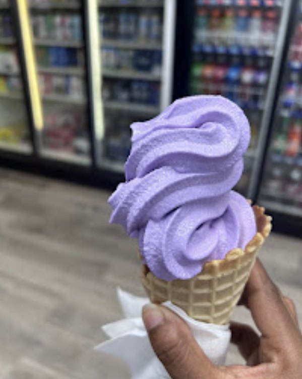 Ube soft serve swirl in a waffle cone at Sweet Code in Bradford